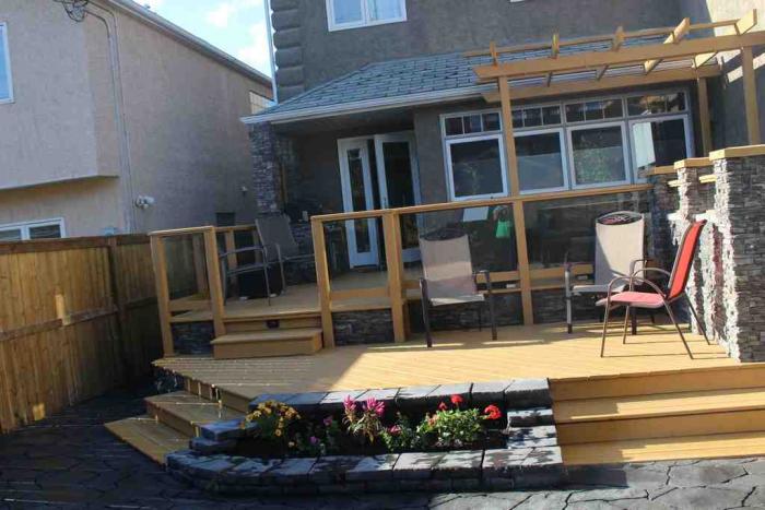 Deck Design by A Green Future - Your Calgary Deck Builders. Professional deck builders in Calgary use rules to ensure decks are properly scaled to fit the house.